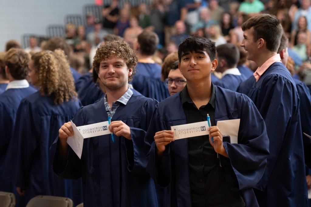 Students at the Opening Ceremony writing their goals